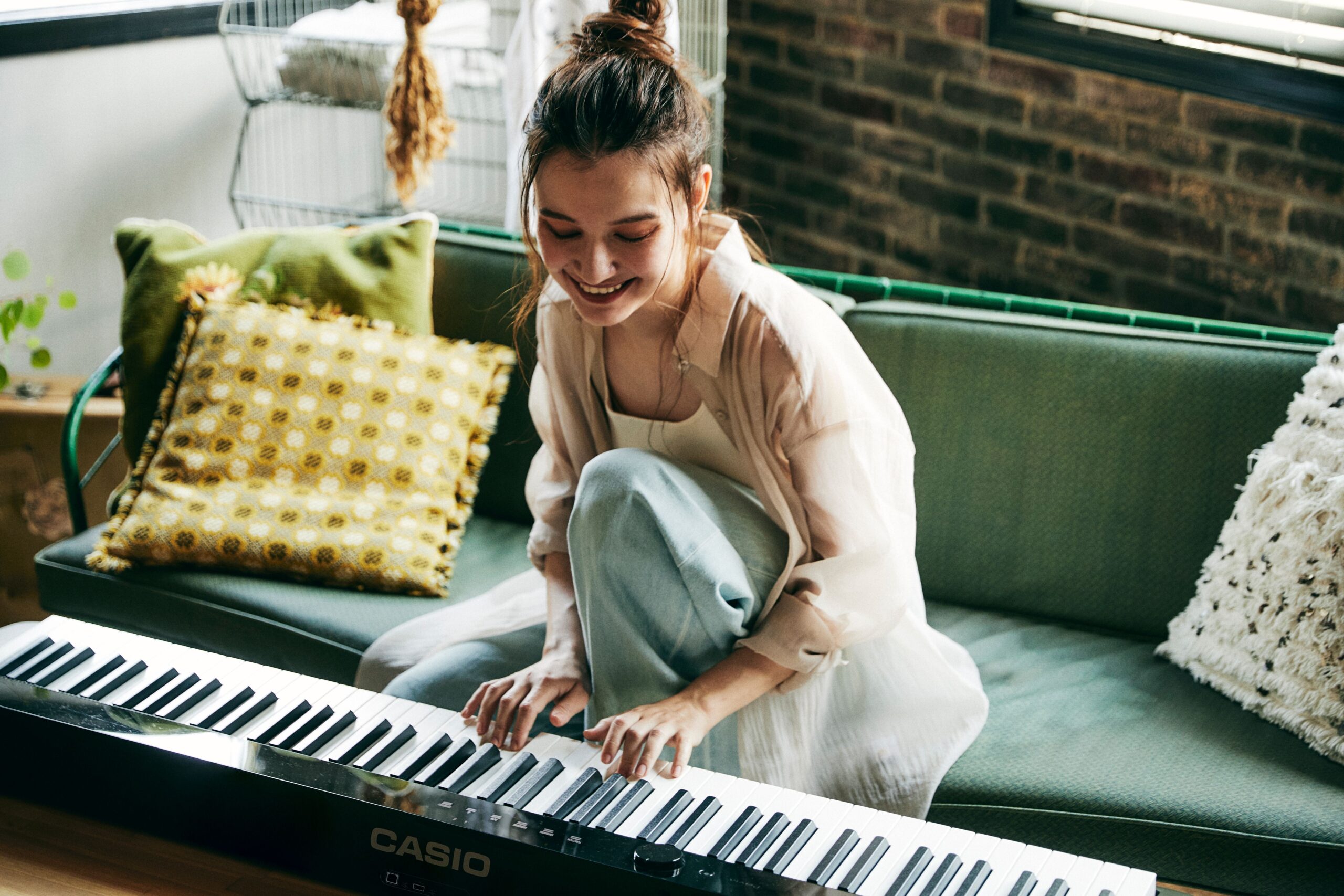 Music Education session playing piano in Exeter